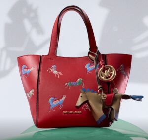 Red Bag: Michael Kors’ Bold Horse-Inspired Icon