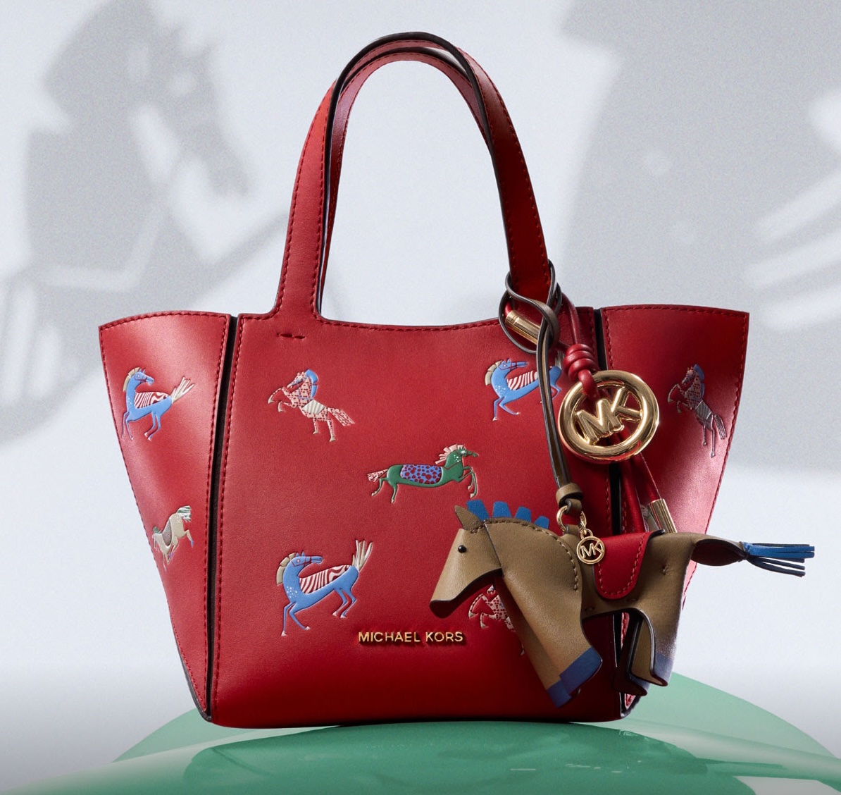 Red Bag: Michael Kors’ Bold Horse-Inspired Icon